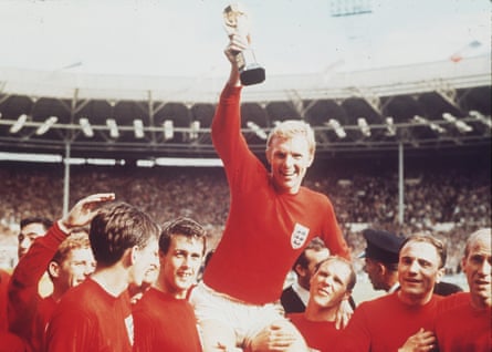 Bobby Moore holds aloft the World Cup.