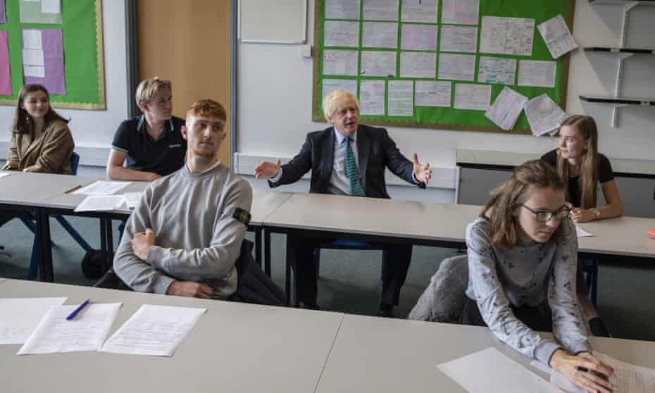 Boris Johnson sits in on a class at Castle Rock school in Coalville
