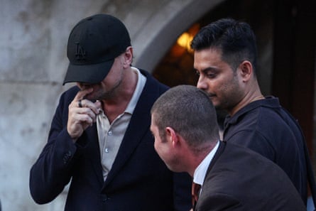 Leonardo DiCaprio keeping a low profile while boarding a boat.