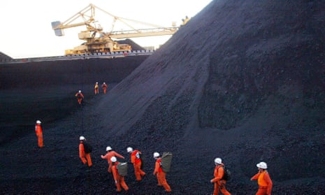 Greenpeace activists attempting to disrupt coal loading at Newcastle, the world’s largest coal port