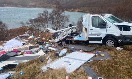 Scene of devastation after the rented vehicle rolled over several times, with the family of four and two dogs still inside, with the van falling apart around them