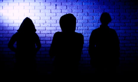 Silhouettes of three teenagers