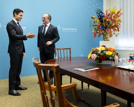 Coalition scout Wouter Koolmees (R) receives D66 party leader Rob Jetten for a meeting, in The Hague, the Netherlands.