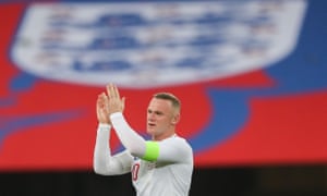 Wayne Rooney applauds England fans after the final whistle.