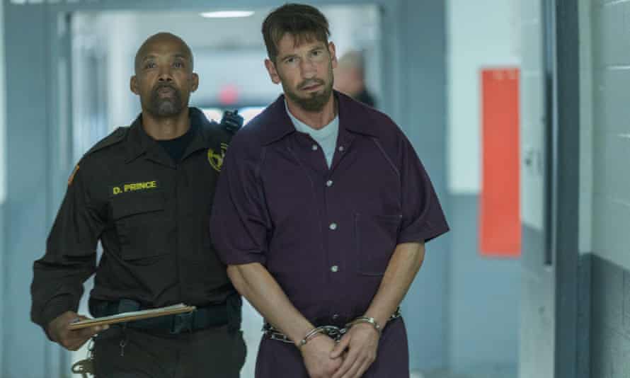 a scene from We Own This City with Jon Bernthal in prison clothes