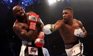 Anthony Joshua Beats Carlos Takam By Tko To Retain World