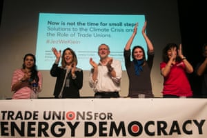 A panel of speakers, including Jeremy Corbyn and Naomi Klein, speaking at the Trade Unions for Energy Democracy (TUED) event in the Salle Olympe de Gouges, Paris, 2015.