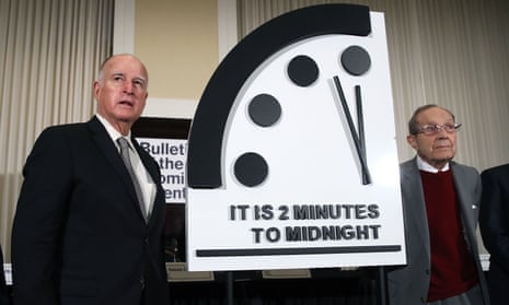 The former California governor Jerry Brown, left, and former US secretary of defence William Perry unveil the Doomsday Clock in Washington DC on Thursday.
