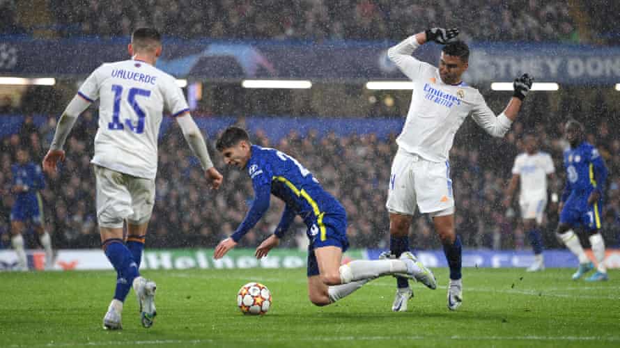 Kai Havertz of Chelsea takes a tumble after a tackle by Casemiro of Real Madrid.