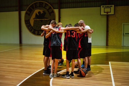 High School BBall team pray before a game, Australia