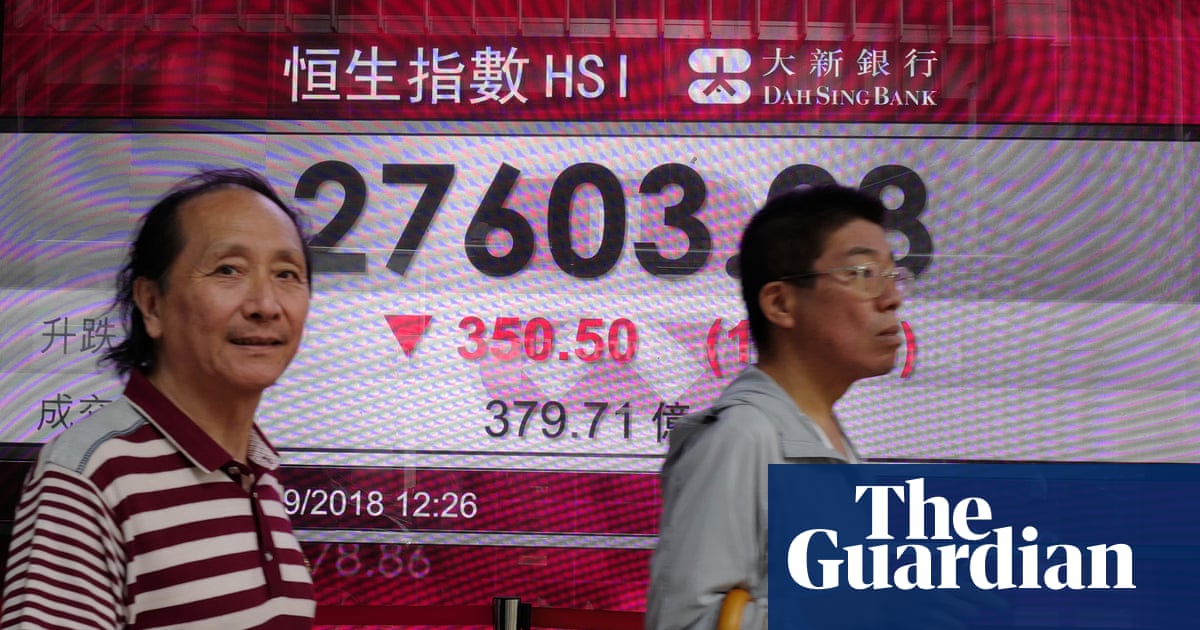 Trade war: US is putting a knife to China's neck, says top official | Business | The Guardian