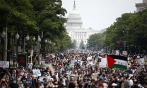 Demonstrators walk through Washington DC on Saturday