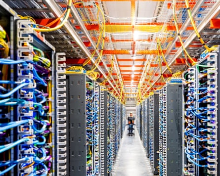 A technician works at an Amazon Web Services AI data centre