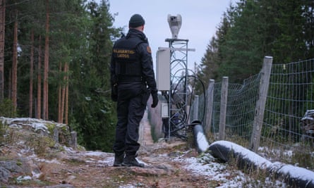 A Finnish border guard near the border crossing at Pelkola, Imatra, in November 2022.