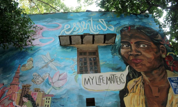 A mural depicting a woman's face and slogan 'My Life Matters', on an apartment building in New Delhi by  Shilo Shiv Suleman, founder the Fearless Collective, which creates public art with misrepresented communities.
