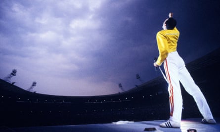 Freddie Mercury performing with Queen at Wembley Stadium, London, 1986.