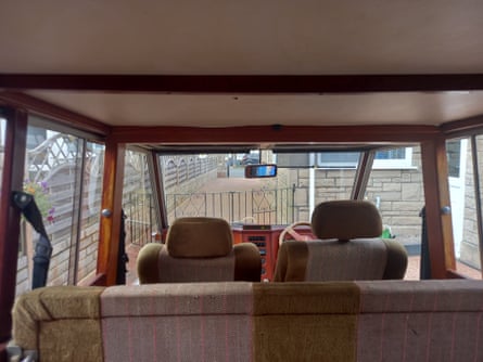 Interior of Hustler showing driver’s seat, as seen from back seats.