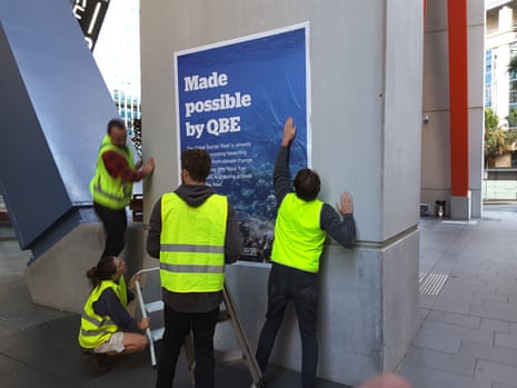 A protest against QBE Insurance in Sydney over its business with coalminers and other fossil fuel-based projects by environmental activist group Market Forces on Monday morning.