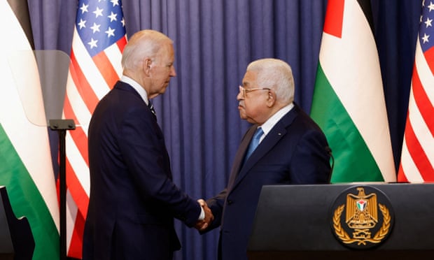 Joe Biden shakes hands with Mahmoud Abbas