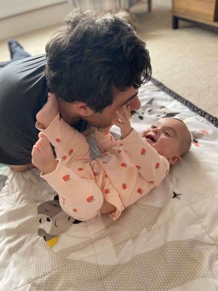 Genevieve Meehan plays with her father