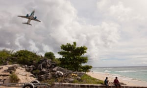A plane takes off from the island of Nauru.