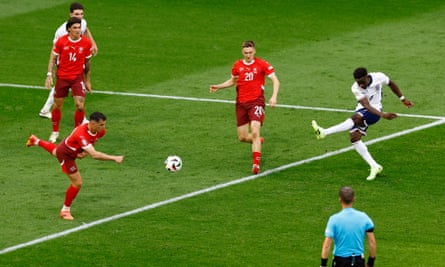 Bukayo Saka equalises for England against Switzerland with a shot from the edge of the box.
