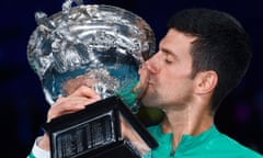 Close up of Djokovic kissing trophy