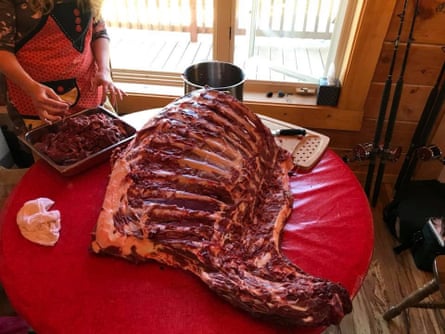 A moose neck and ribcage being processed at home. The motorist that hits an animal may not keep any part of the meat; instead, highway troopers keep a running list of residents to receive it.