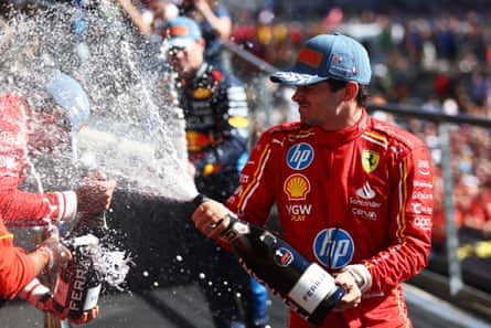 Charles Leclerc celebrates on the podium after his masterful drive in Austin gave him his eighth grand prix victory.