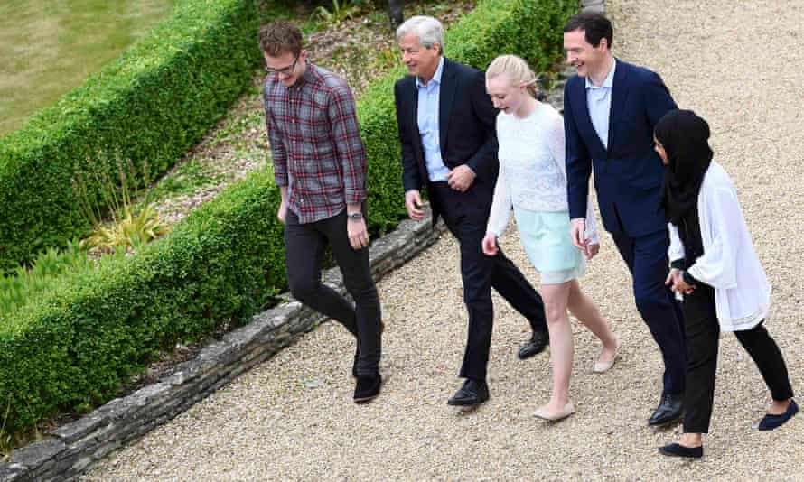 Jamie Dimon, second from left, with staff and George Osborne this month during a visit to JP Morgan’s corporate centre in Bournemouth.