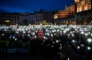 Krakow, Poland. Thousands of people hold lit-up phones in the main square during a protest after the death of 30-year-old Izabela, who died in the 22nd week of her pregnancy because doctors did not abort the dying fetus under the country’s anti-abortion law