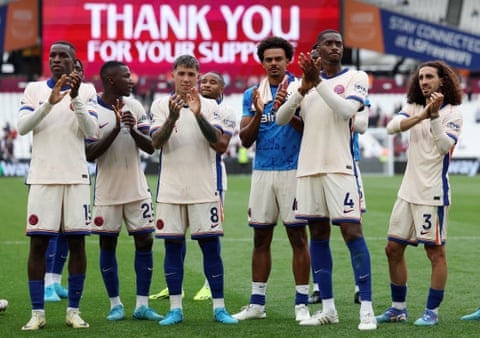 Chelsea players applaud the fans after West Ham win.