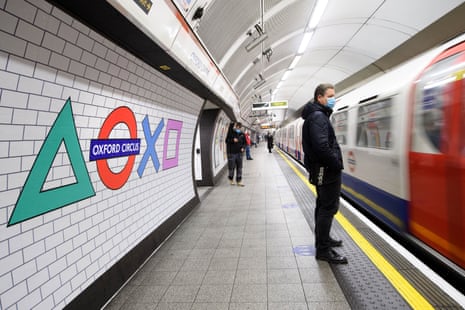 Signs at Oxford Circus underground station, in London, last November promote the UK launch of PlayStation 5.