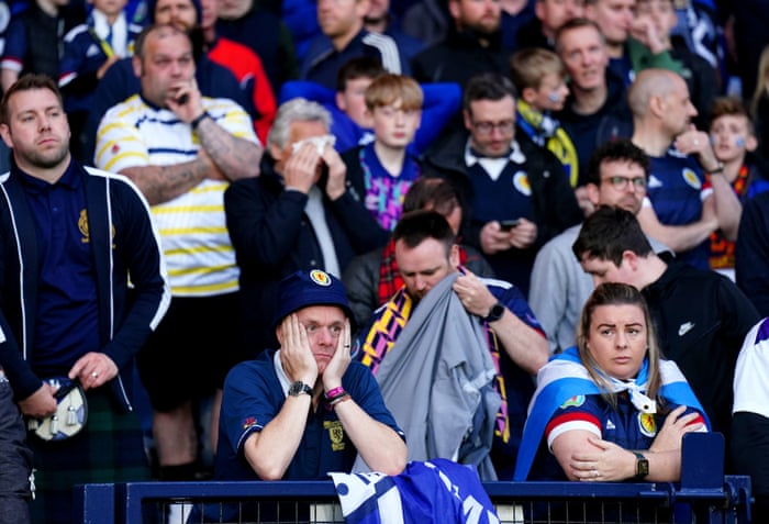 Scotland fans appear dejected.