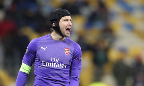 Arsenal goalkeeper Petr Cech bellows at this defence.