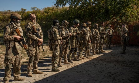 Line of recruits holding weapons