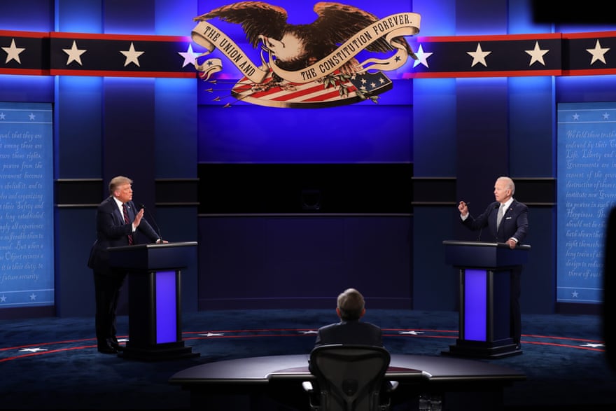 Donald Trump and Joe Biden participate in a presidential debate in Cleveland, Ohio, on 29 September.