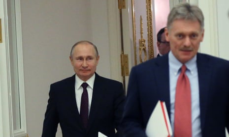 Vladimir Putin, Russia’s president and his press secretary, Dmitry Peskov, at the Kremlin.