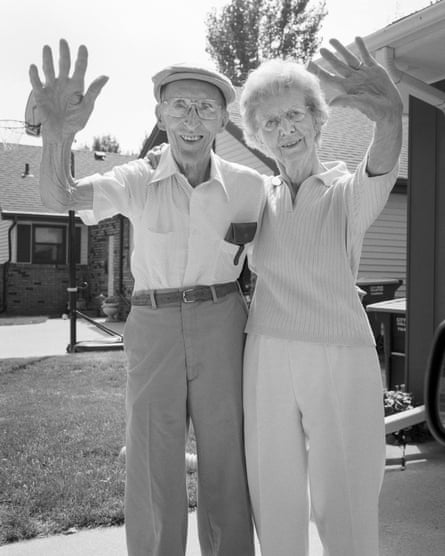 Old couple waving