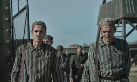 ‘It is definitely one man’s story’ … Hauer-King with Adam Karst in The Tattooist of Auschwitz.
