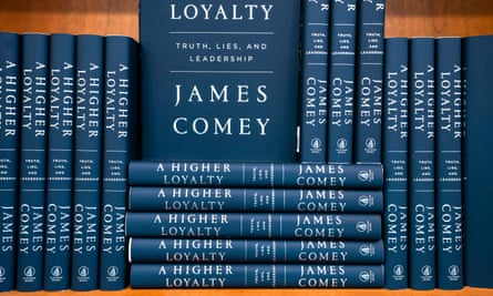 Copies of James Comey’s book, A Higher Loyalty: Truth, Lies, and Leadership, line the shelves of a Washington bookstore.