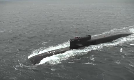 Submarine powering along surface of water