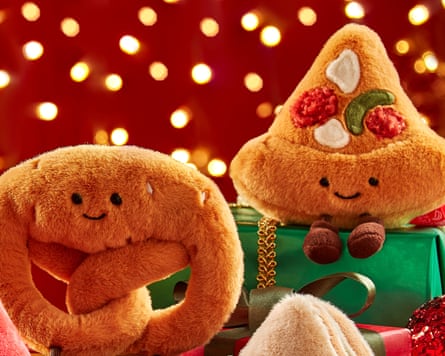 Pretzel and pizza-slice soft toys.