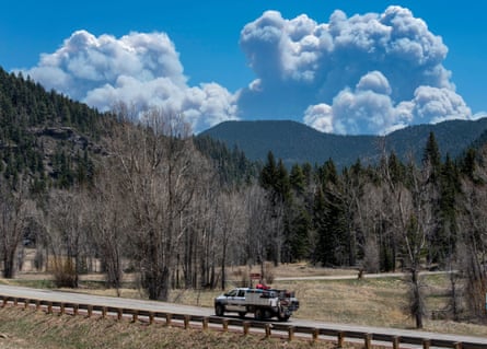 The wildfire in New Mexico has been fanned by strong winds, hindering firefighting efforts.