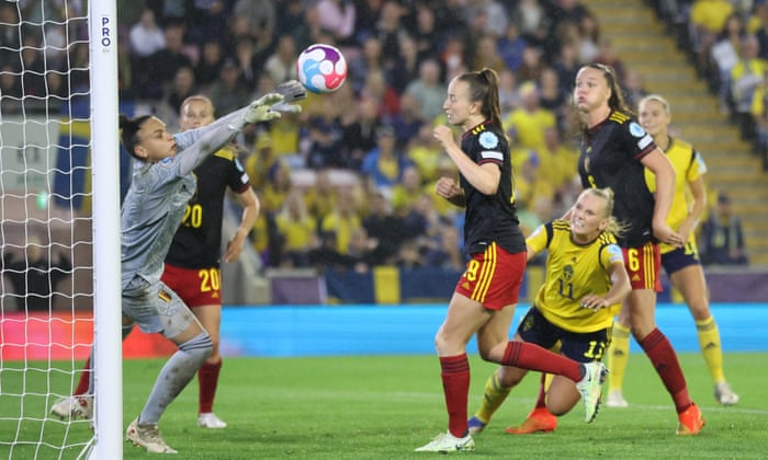 Belgium’s Nicky Evrard makes a save from Sweden’s Stina Blackstenius.