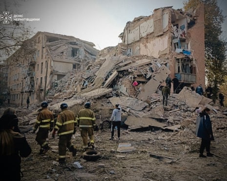 Rescuers work at a site of an apartment building damaged by a Russian missile strike in the town of Pryluky, Chernihiv region, Ukraine.