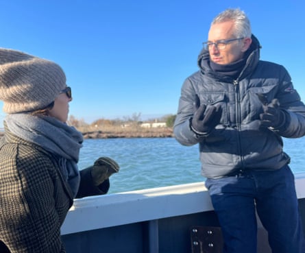 ‘Precious, sacred ecosystem’ … Hunter and Andrea D’Alpaos exploring the Venetian lagoon.
