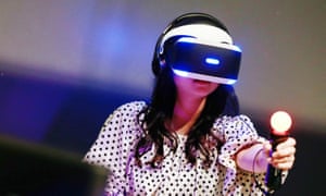 A visitor dons a Sony PlayStation VR headset at Tokyo’s National Museum of Emerging Science and Innovation.