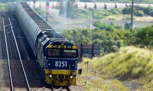 A coal train departs Newcastle port