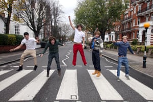 Zayn Malik, Harry Styles, Liam Payne, Louis Tomlinson and Niall Horan of One Direction at the zebra crossing at Abbey Road, London
